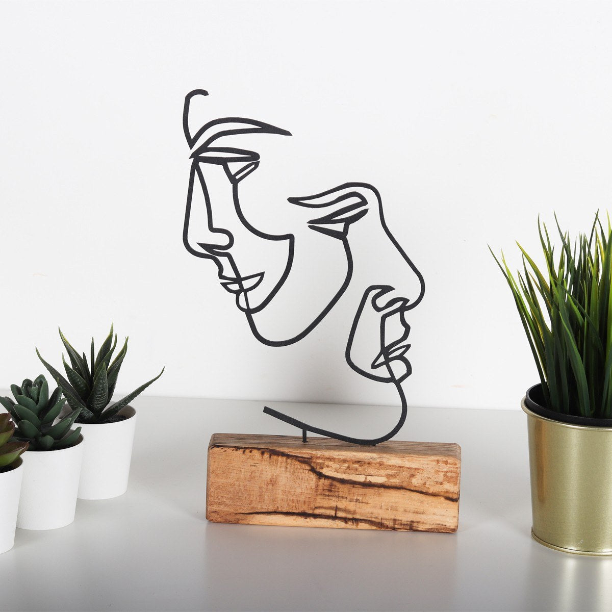 Accesoriu decorativ Faces, negru, metal/lemn, 17x38 cm