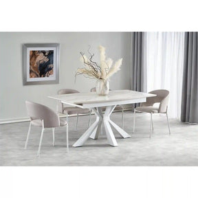 Masă extensibilă albă într-un living modern, alături de scaune elegante – primabucata