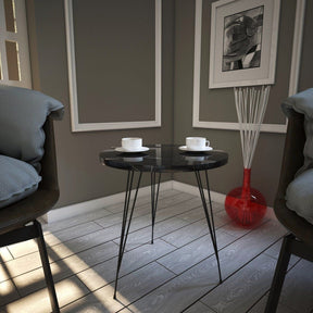 Măsuță de cafea neagră, modernă, într-un living elegant – primabucata